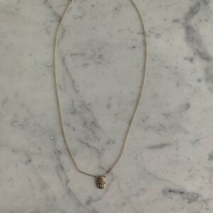 Gold plated hand necklace